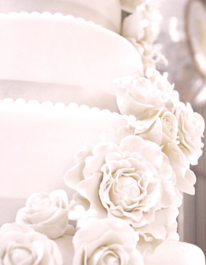 Sugar roses on an ivory tier